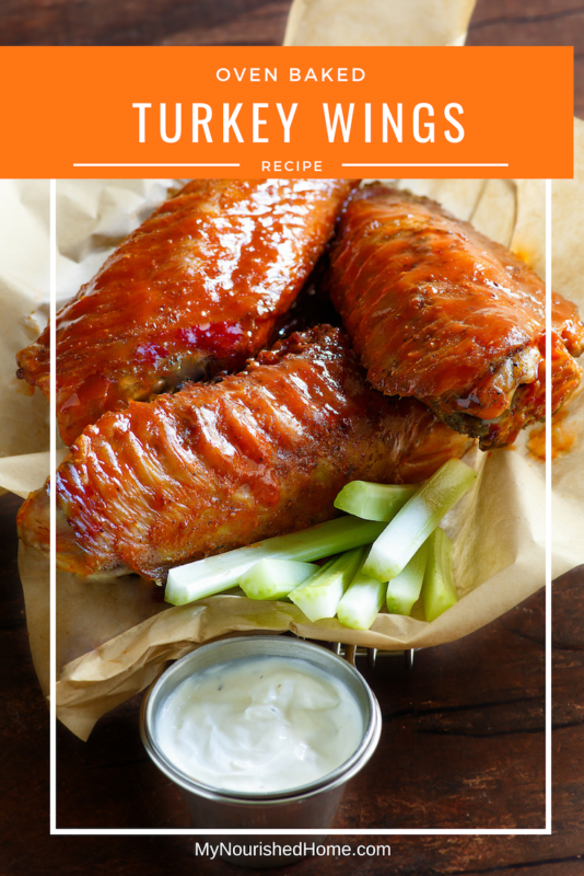 Oven Baked Turkey Wings on a plate with BBQ sauce.