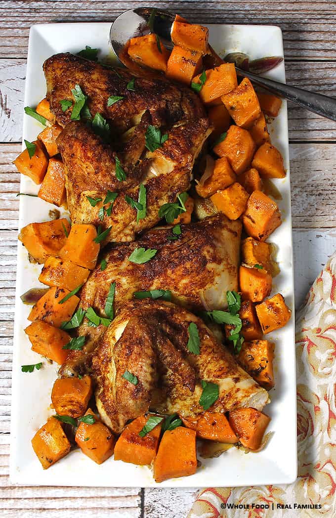 Can't get enough fast, simple chicken recipes? This Warm Spiced Chicken over Sweet Potatoes is one of the most pinned recipes from Whole Food | Real Families. And it all cooks on a single sheet pan for fast cleanup!