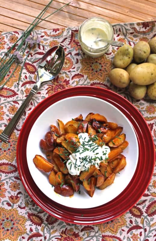 Honey Sriracha Fries with Creme Fraiche and chives 