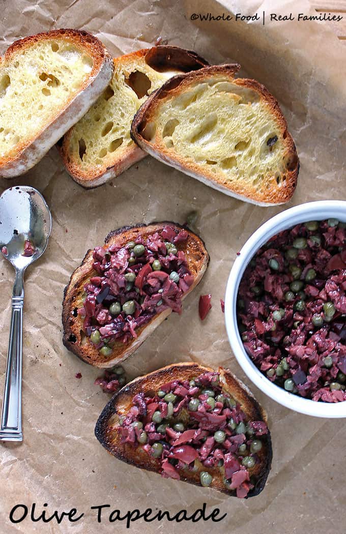 Olive Tapenade is a perfect appetizer for guests or recipe for a light dinner. Assembles in less than 5 minutes. Find more recipes like these at www.wholefoodrealfamilies.com.