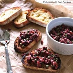 Olive Tapenade is a perfect appetizer for guests or a perfect recipe to go with a light dinner. Only takes 5 minutes to prepare. Get more recipes like this one at www.wholefoodrealfamilies.com.