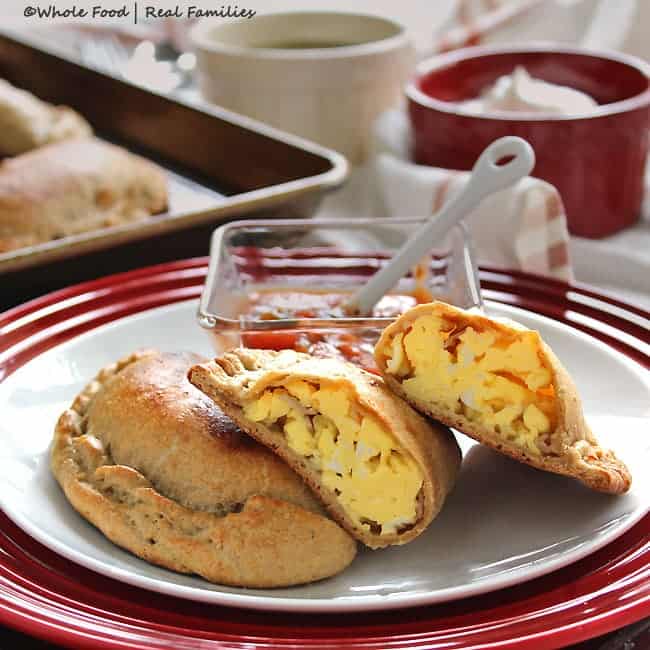Whole Wheat Breakfast Empanadas are perfect for grab and go breakfast recipes during the week. And a perfect hang out at the kitchen table, slow food meal on the weekend. Get the recipes from Whole Food | Real Families at www.wholefoodrealfamilies.com