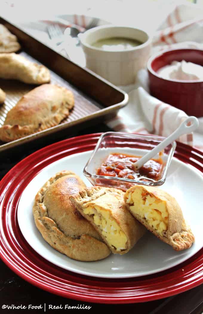 Whole Wheat Breakfast Empanadas are perfect for grab and go breakfast recipes during the week. And a perfect hang out at the kitchen table, slow food meal on the weekend. Get the recipes from Whole Food | Real Families at www.wholefoodrealfamilies.com 
