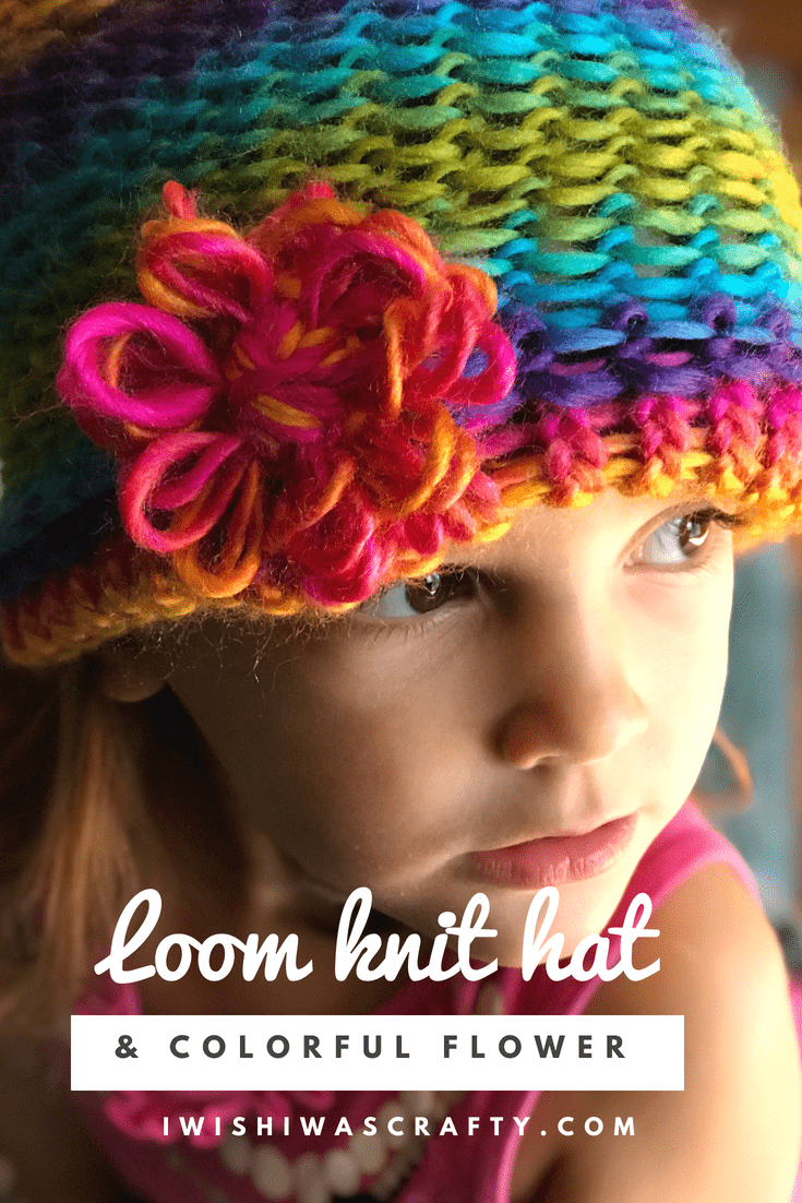 Colorful knit hat with decorative flower you can attach on the brim or the top!