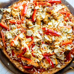 Parmesan pizza on baking stone