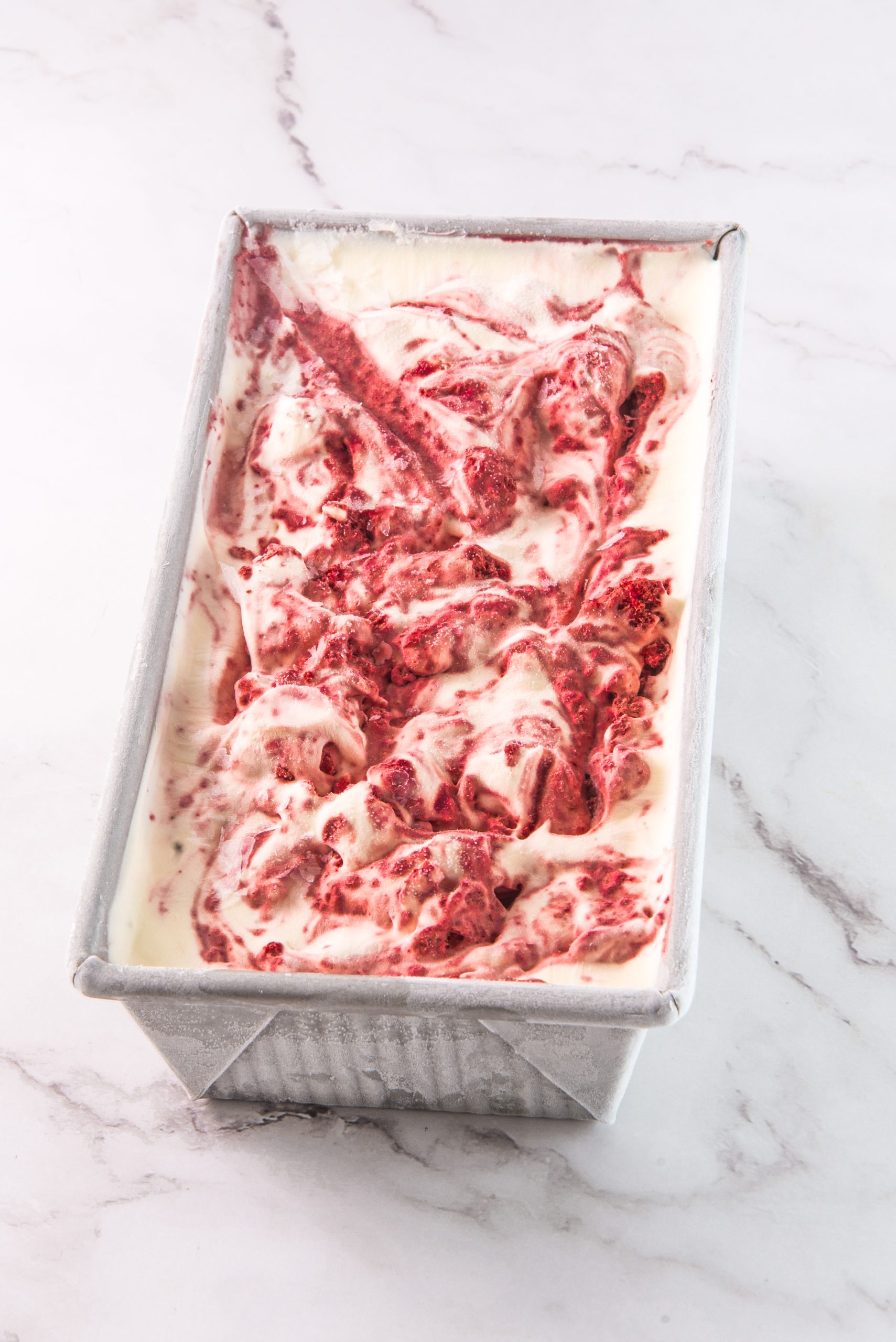 Red Velvet Ice Cream frozen in a cake pan