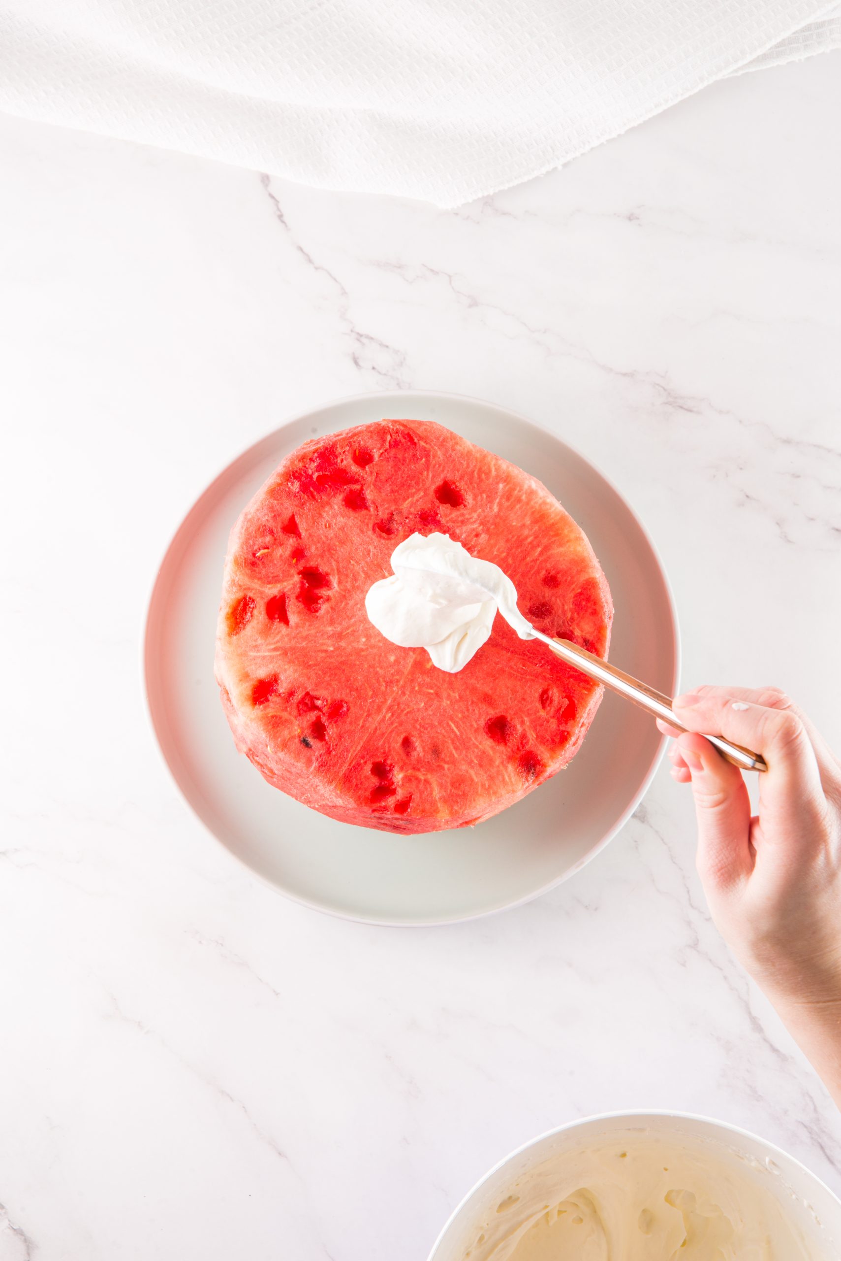 watermelon cake being made 