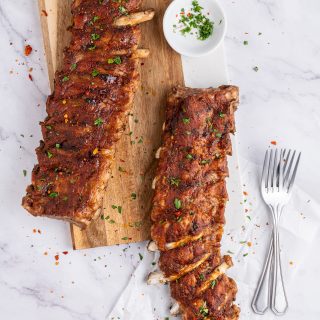 Overhead of two racks of Instant pot baby back ribs