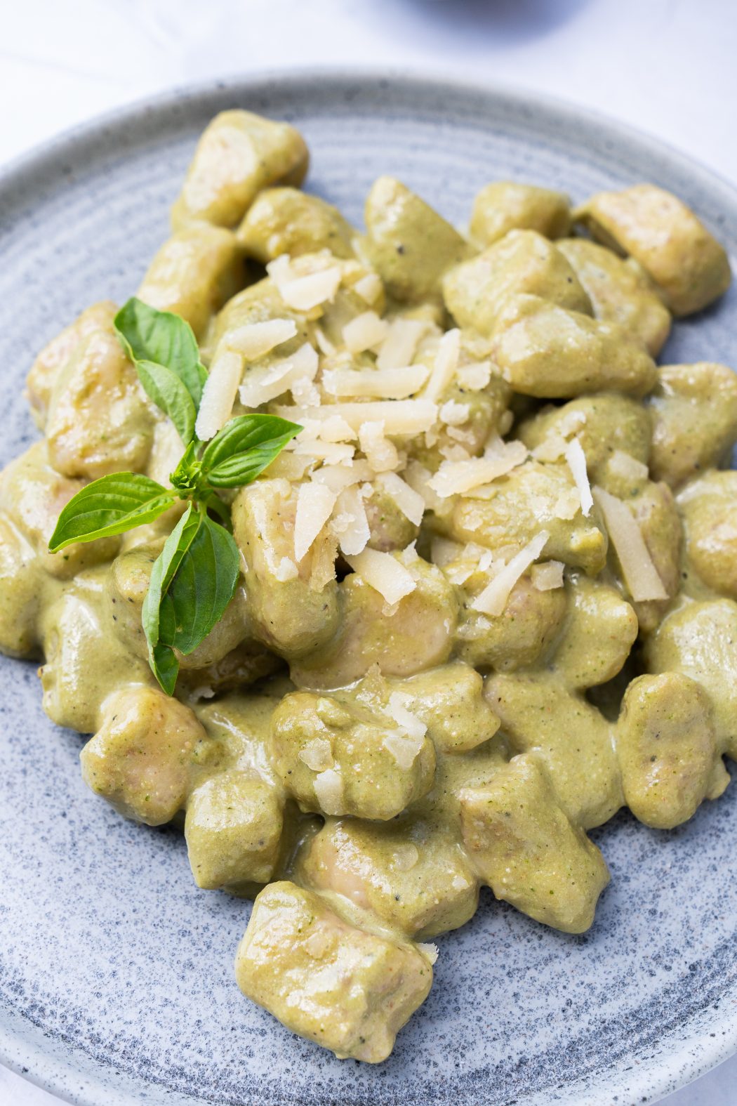 Closeup of potato gnocchi and parmesan cheese