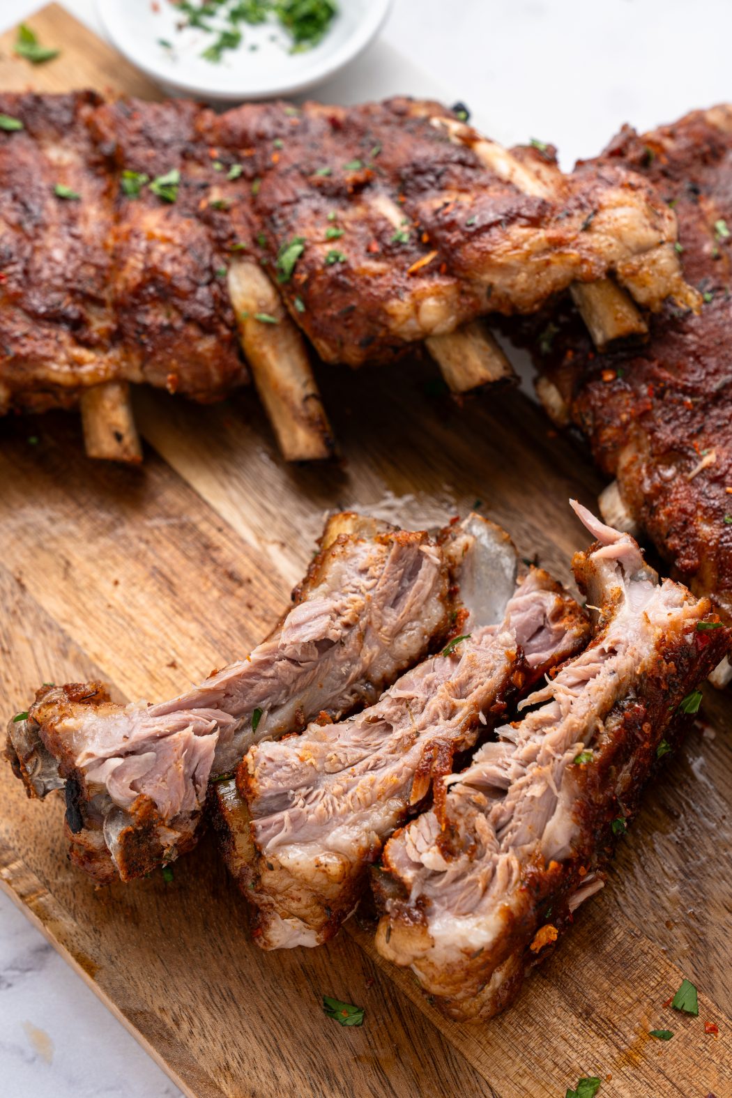 Instant pot baby back ribs on a cutting board