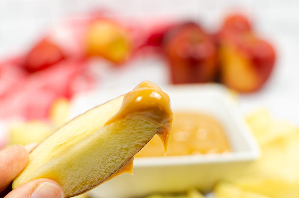 dulce de leche on an apple slice
