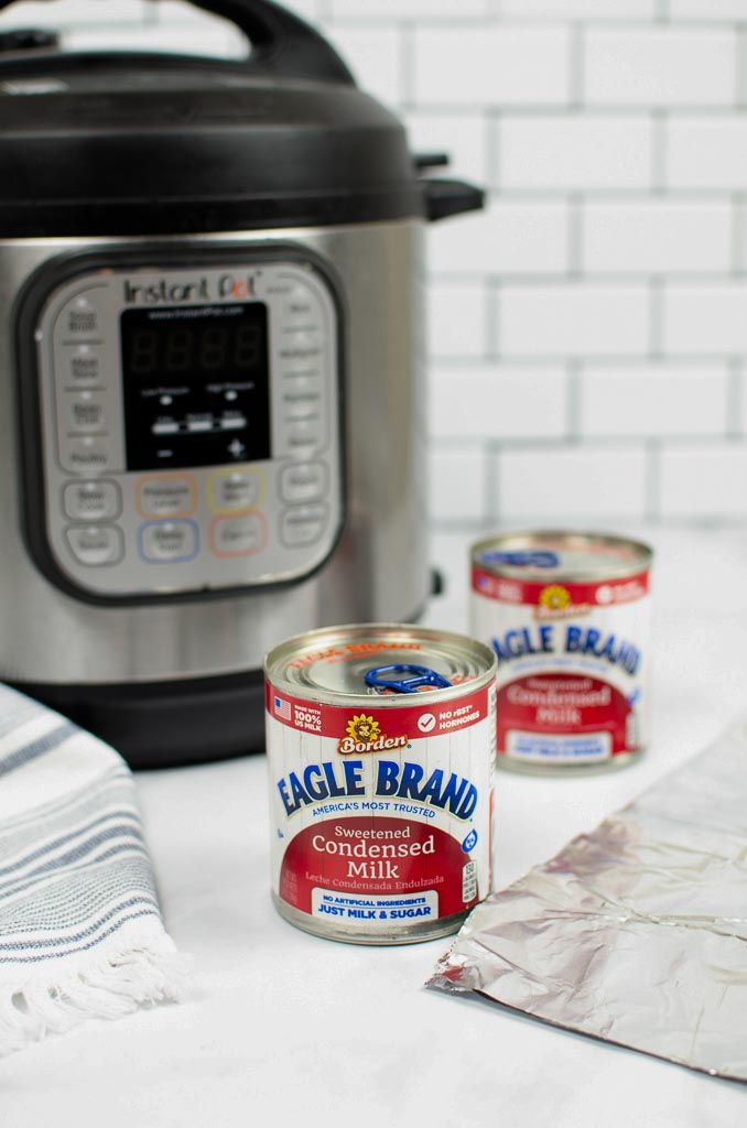 sweetened condensed milk in front of an instant pot for dulce de leche
